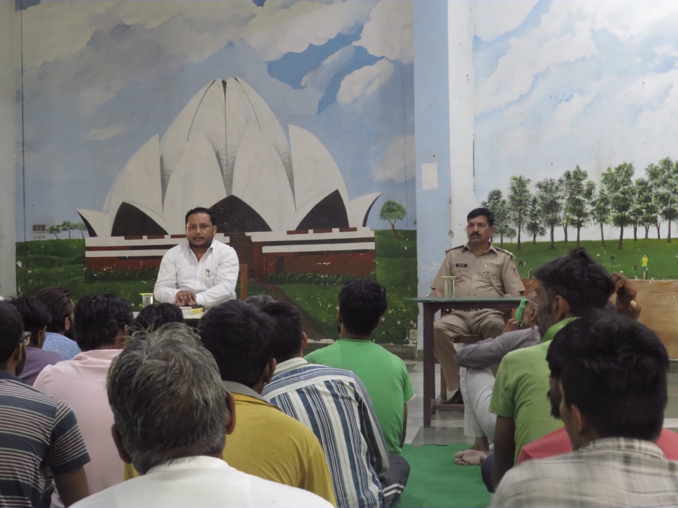 Legal awareness session addressing a seated audience
